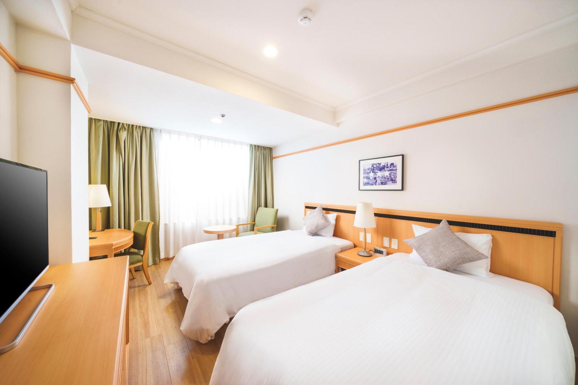 Orion Hotel Naha Szoba fotó